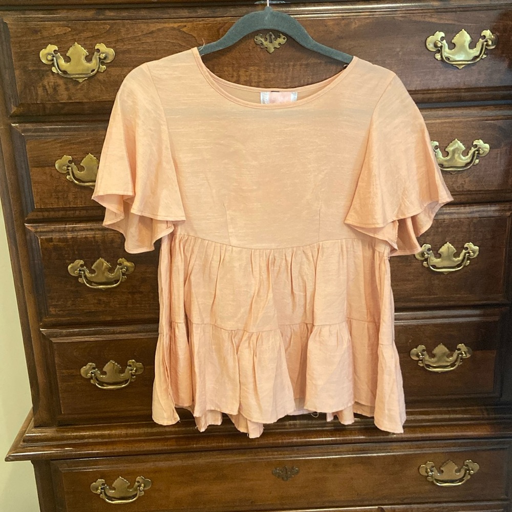 Orange top with ruffles!
